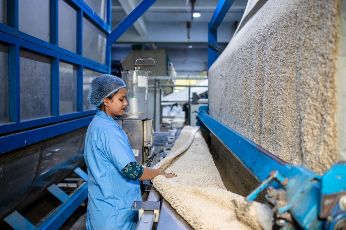 Spanish factory floor with machinery and workers
