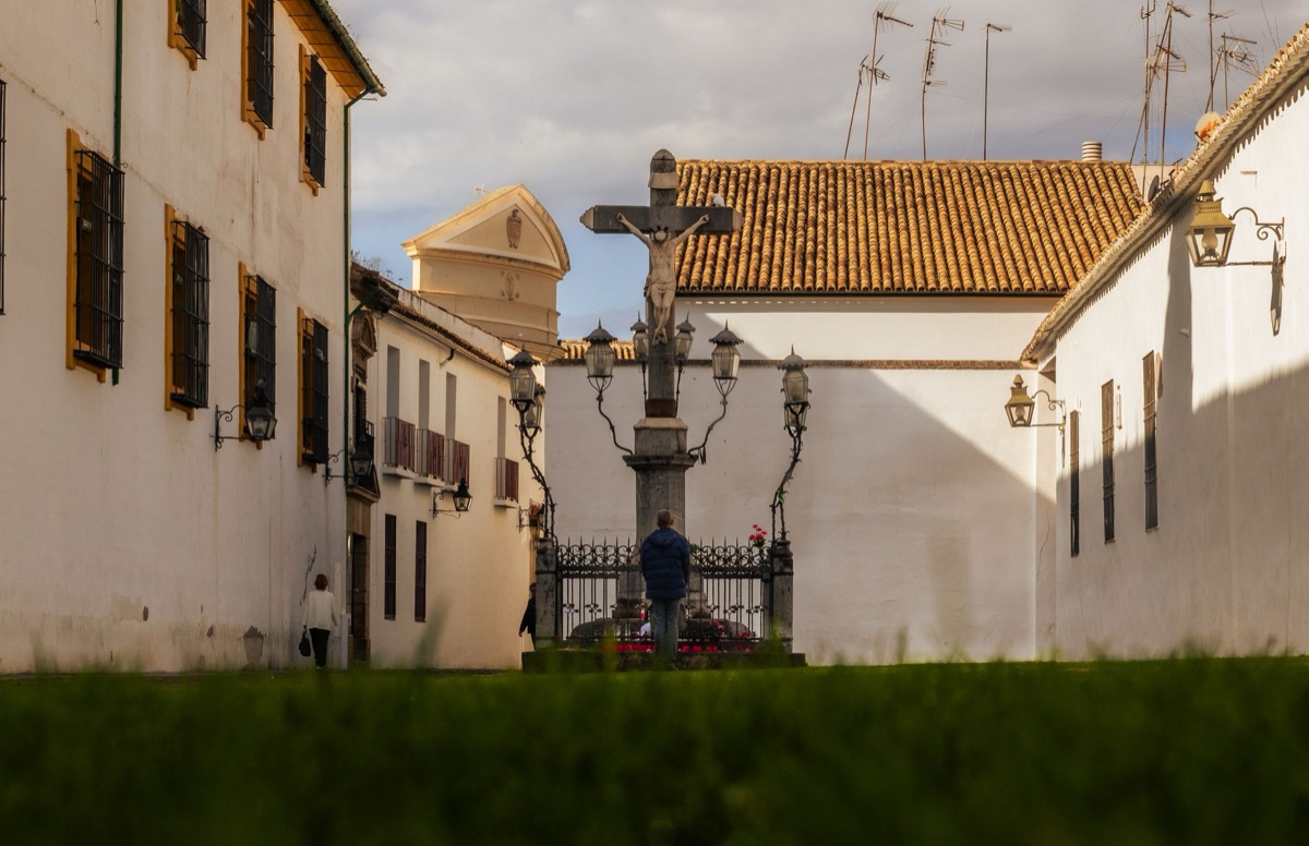 spanish town square with religious symbols